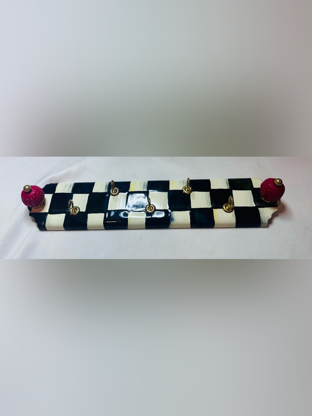 MacKenzie-Childs Black and White Checkerboard Wall Hook Rack with Pink Finials